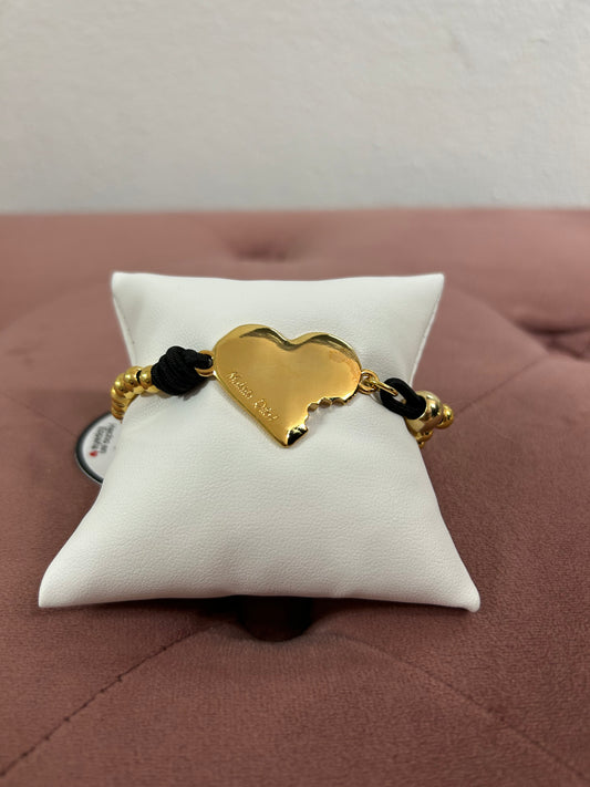 Gold bracelet corazón mordido
