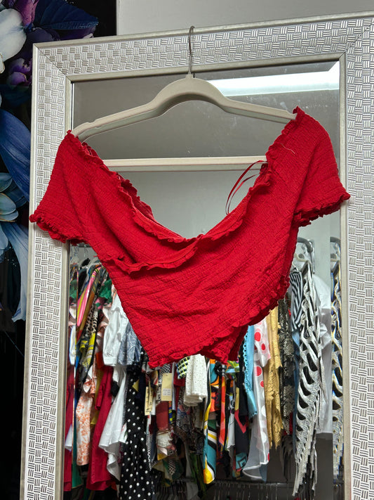 Crossed red top