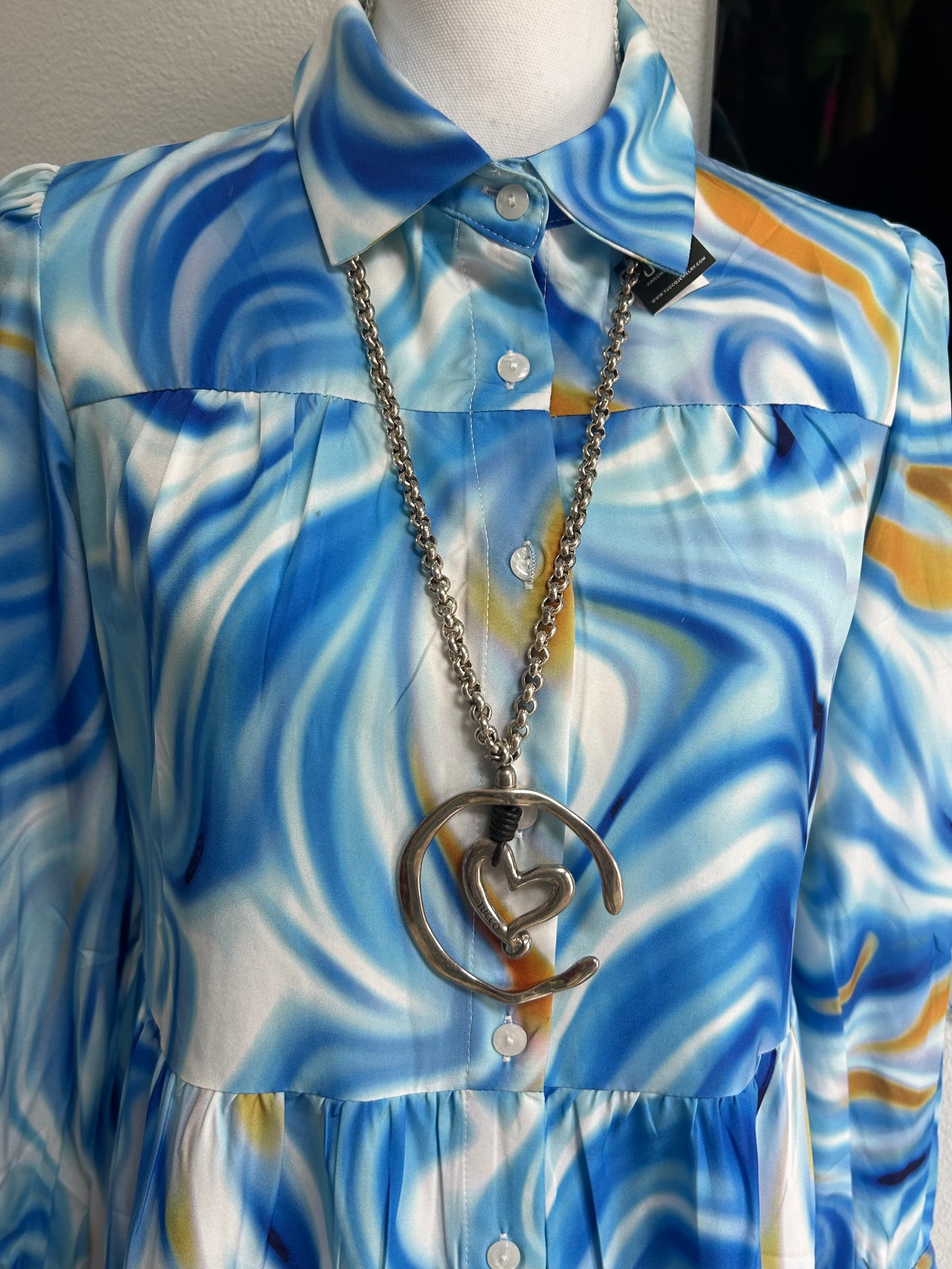 TUCCO CIRCLED HEART NECKLACE